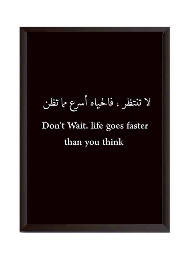 لوحة فنية بإطار من الخشب لديكور الحائط مطبوعة بعبارة "Don't Wait Life Goes Faster Than You Think" أبيض/ أسود 32x22سم