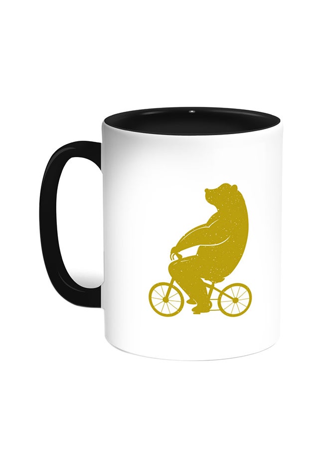 ديكالاك قدح قهوة - صورة دب يقود دراجة أسود/ أبيض