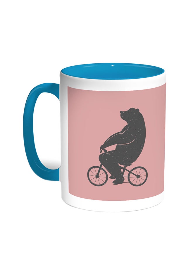 ديكالاك قدح قهوة - صورة دب يقود دراجة تركواز/أبيض