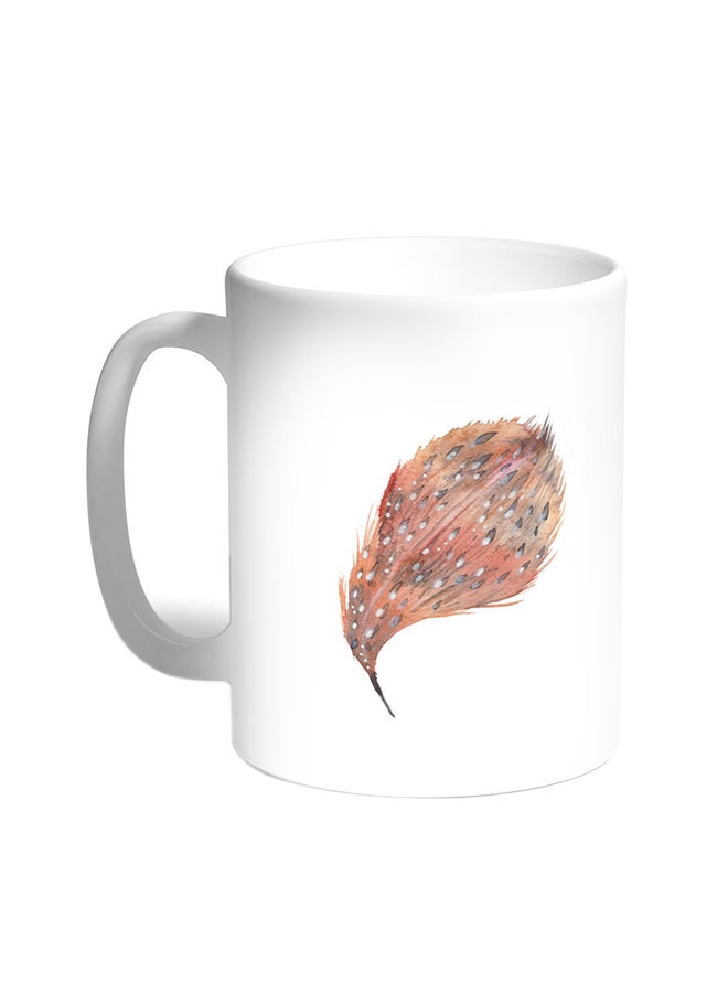 قدح قهوة - ريشة طائر أبيض