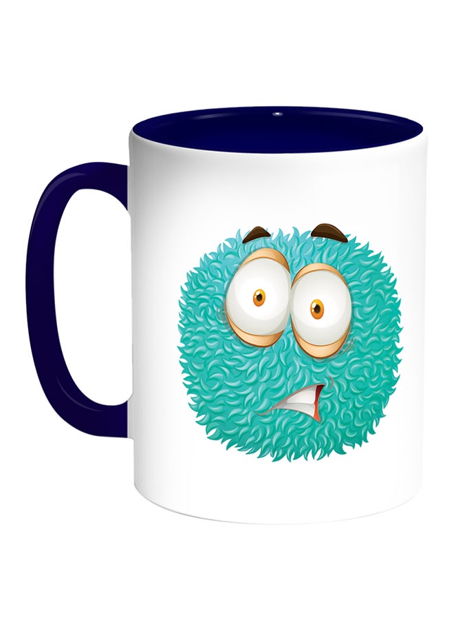 ديكالاك مج قهوة بطبعة وحش ملوّنة أبيض/أزرق