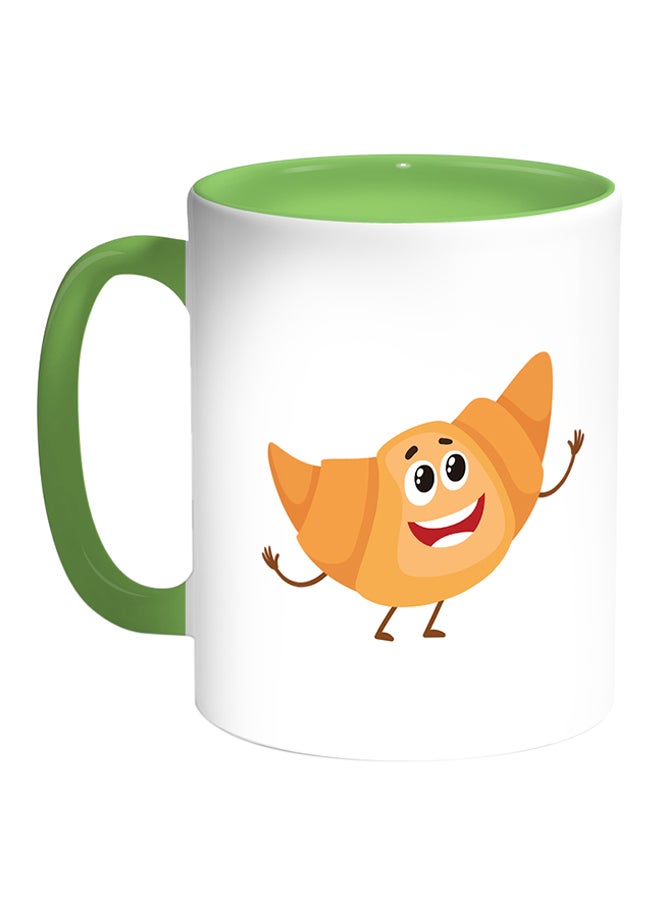 مج قهوة بطبعة طعام على شكل كرواسون أبيض/أخضر