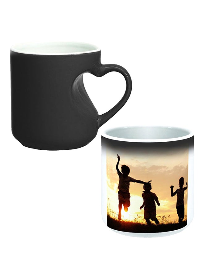 ديكالاك كوب سحري بخاصية تغير الألوان مزود بمقبض على شكل قلب أسود/ أبيض - Image 1