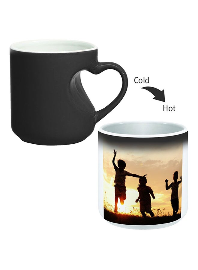 ديكالاك كوب سحري بخاصية تغير الألوان مزود بمقبض على شكل قلب أسود/ أبيض - Image 2