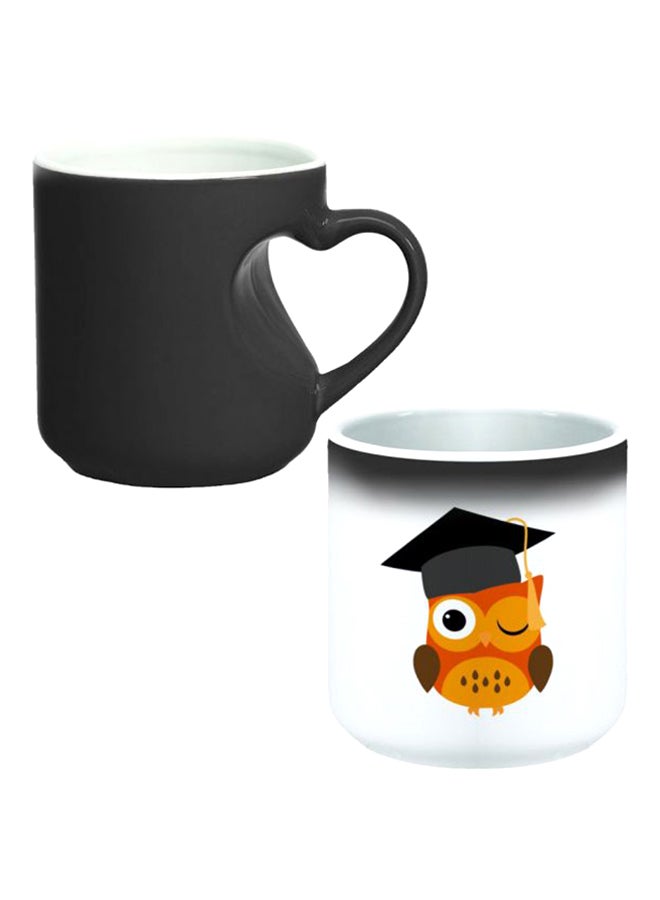 ديكالاك كوب سحري من السيراميك مزود بمقبض على شكل قلب بتصميم منحنٍ إلى الداخل أسود/ أبيض - Image 1