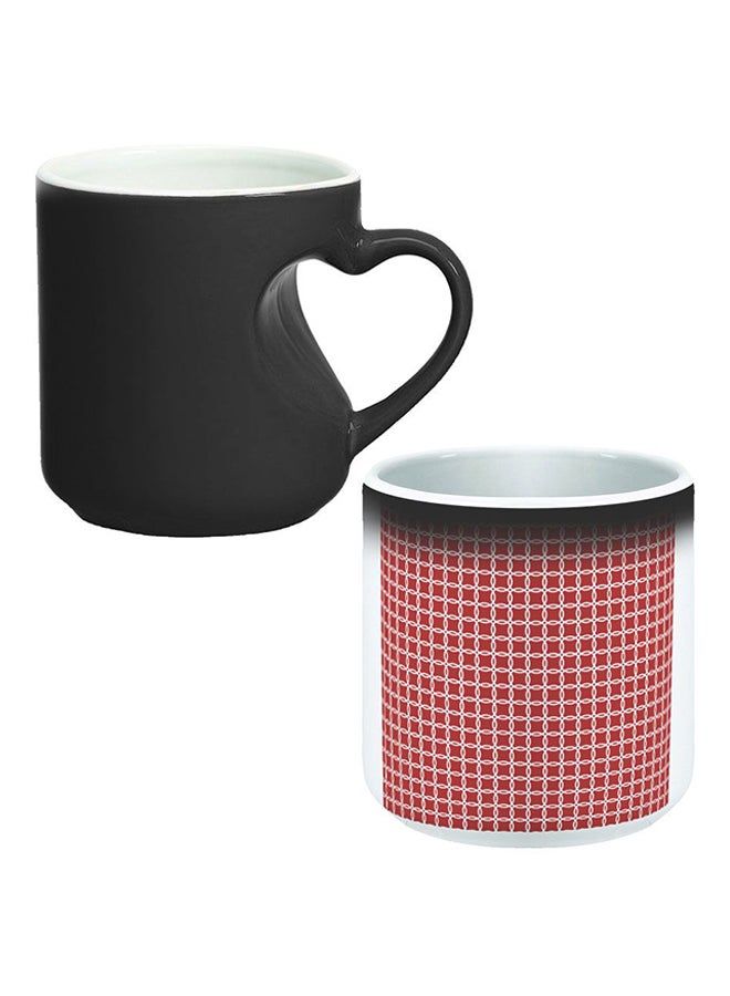 ديكالاك كوب سحري من السيراميك مزود بمقبض على شكل قلب بتصميم منحنٍ إلى الداخل أسود/ أبيض - Image 1