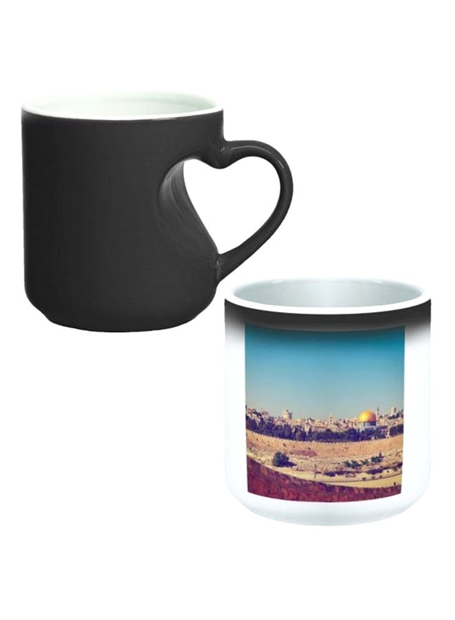 ديكالاك كوب سحري من السيراميك مزود بمقبض على شكل قلب بتصميم منحنٍ إلى الداخل أسود/ أبيض - Image 1