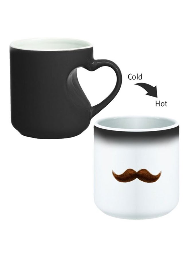 ديكالاك كوب سحري من السيراميك مزود بمقبض على شكل قلب بتصميم منحنٍ إلى الداخل أسود/ أبيض - Image 2