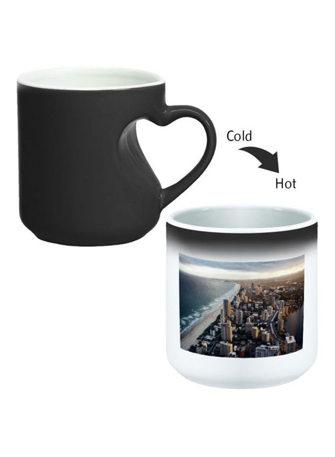 ديكالاك كوب سحري من السيراميك مزود بمقبض على شكل قلب بتصميم منحنٍ إلى الداخل أسود/ أبيض - Image 2