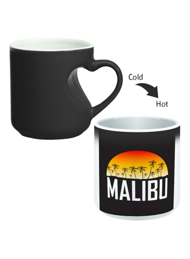 ديكالاك كوب سحري من السيراميك مزود بمقبض على شكل قلب بتصميم منحنٍ إلى الداخل أسود/ أبيض - Image 2