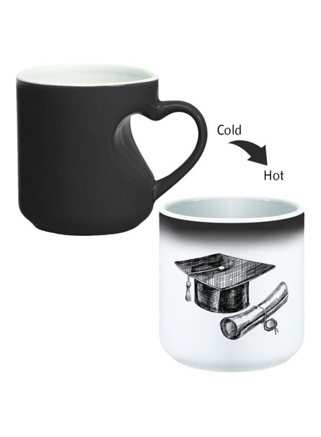 ديكالاك كوب سحري من السيراميك مزود بمقبض على شكل قلب بتصميم منحنٍ إلى الداخل أسود/ أبيض - Image 2