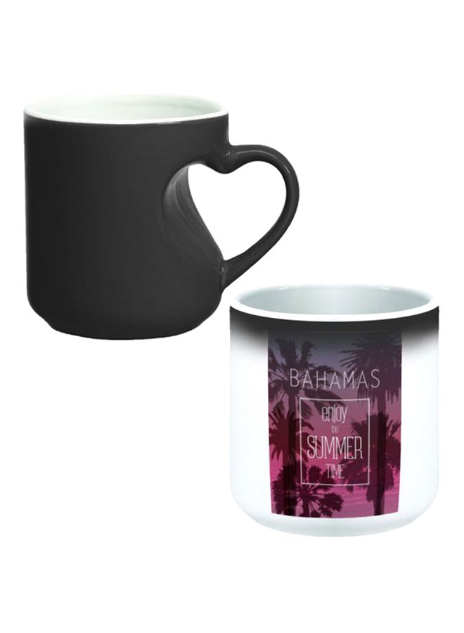 ديكالاك كوب سحري من السيراميك مزود بمقبض على شكل قلب بتصميم منحنٍ إلى الداخل أسود/ أبيض - Image 1