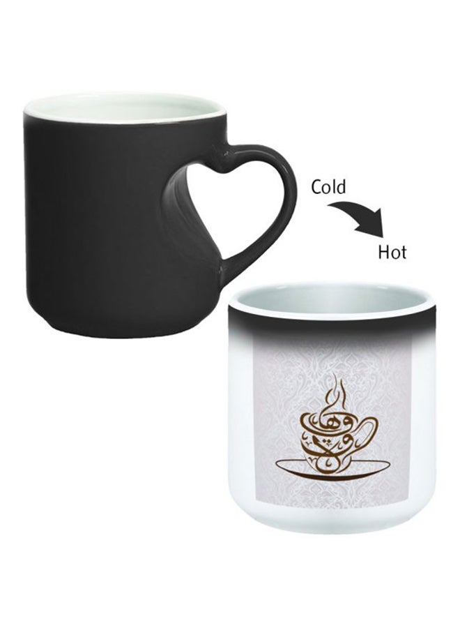 ديكالاك كوب سحري من السيراميك مزود بمقبض على شكل قلب بتصميم منحنٍ إلى الداخل أسود/ أبيض - Image 2