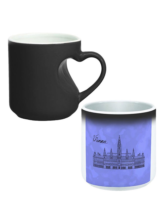 ديكالاك كوب سحري من السيراميك مزود بمقبض على شكل قلب بتصميم منحنٍ إلى الداخل أسود/ أبيض - Image 1