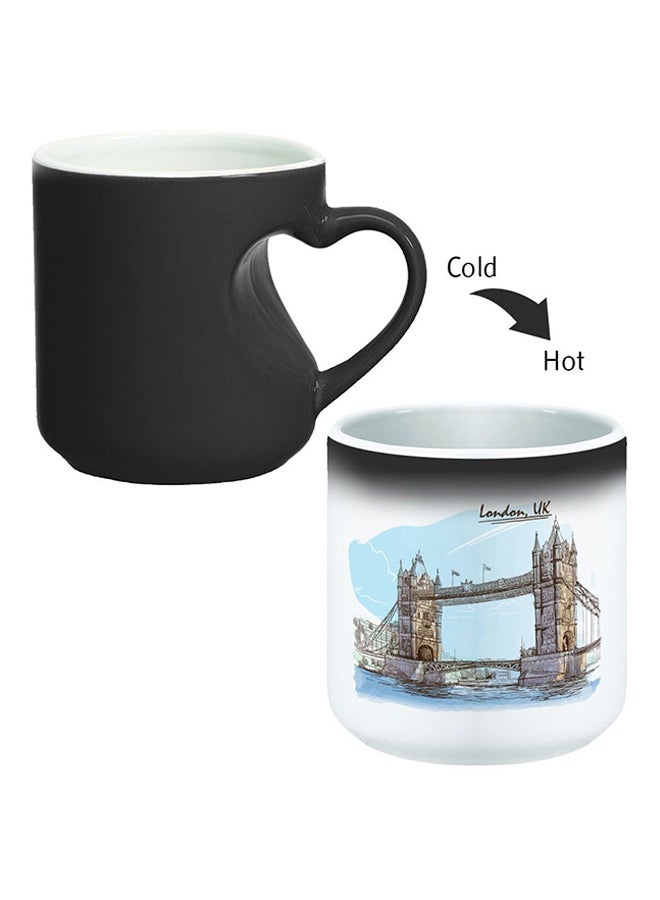 ديكالاك كوب سحري من السيراميك مزود بمقبض على شكل قلب بتصميم منحنٍ إلى الداخل أسود/ أبيض - Image 2