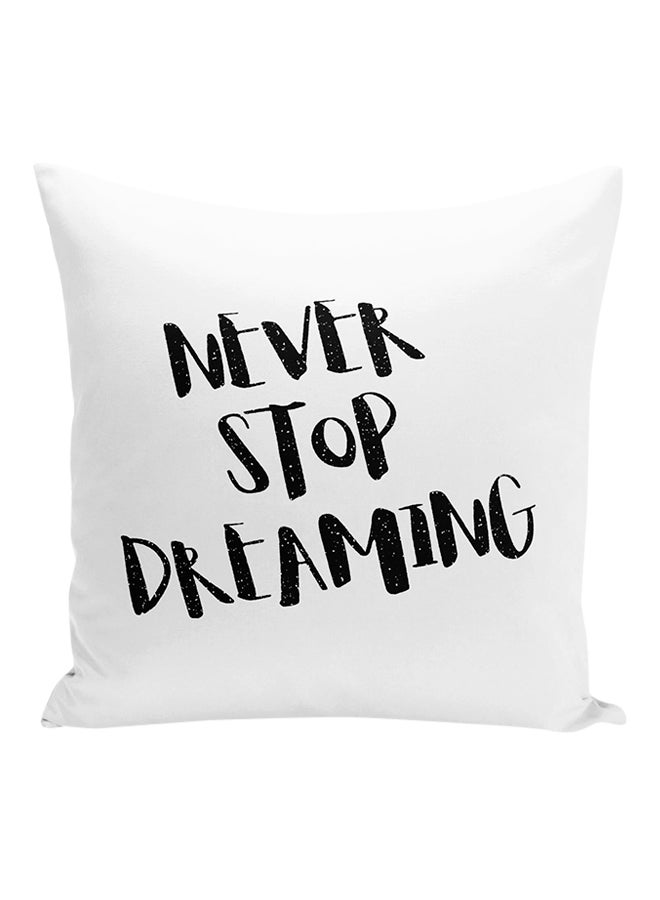 وسادة للزينة مطبوعة بعبارة "Never Stop Dreaming" أبيض/ أسود 16x16بوصة - Image 1
