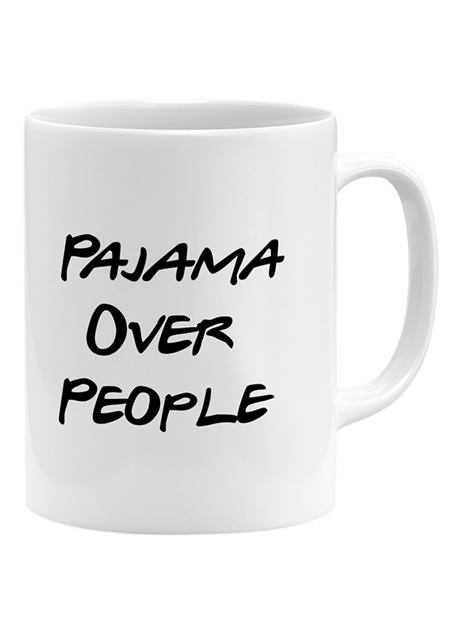 لاود يونيفيرس قدح قهوة مطبوع عليه عبارة "Pajamas Over People" أبيض 11x14سم - Image 1