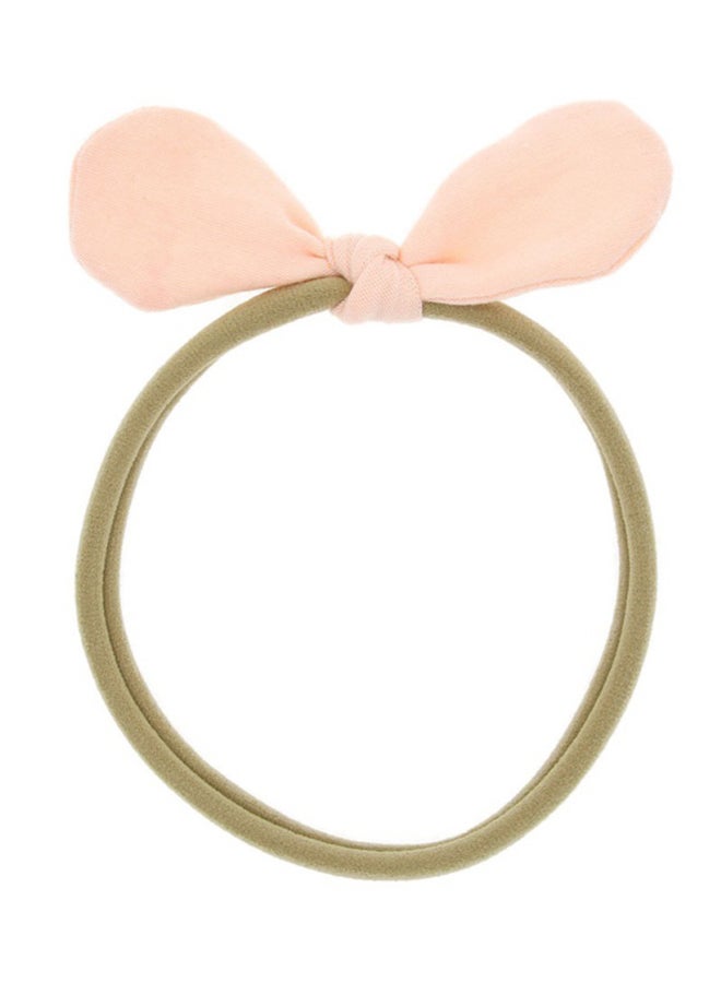 كاكا كيد رباط رأس على شكل عقدة أنشوطية وردي / بيج