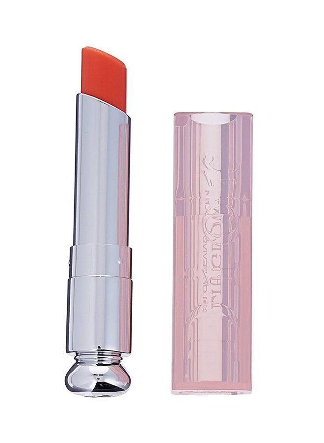 ديور مرطب شفاه آديكت ليب غلو لون آويكنينغ مع عامل واقٍ من الشمس SPF10 مرجاني 004