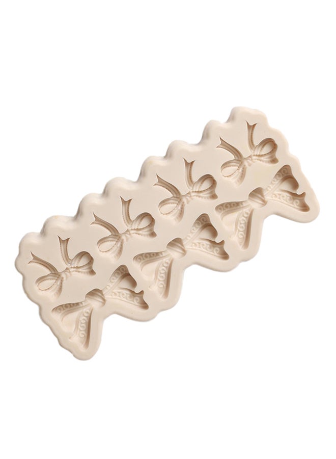 فيس مايل قالب من السيليكون على شكل عقدة أنشوطية للكعكات أبيض 15سم - Image 2