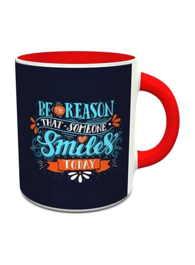 إمبريس مج بتصميم رقم 565 مطبوع عليه عبارة "Be The Reason" كحلي/ أحمر