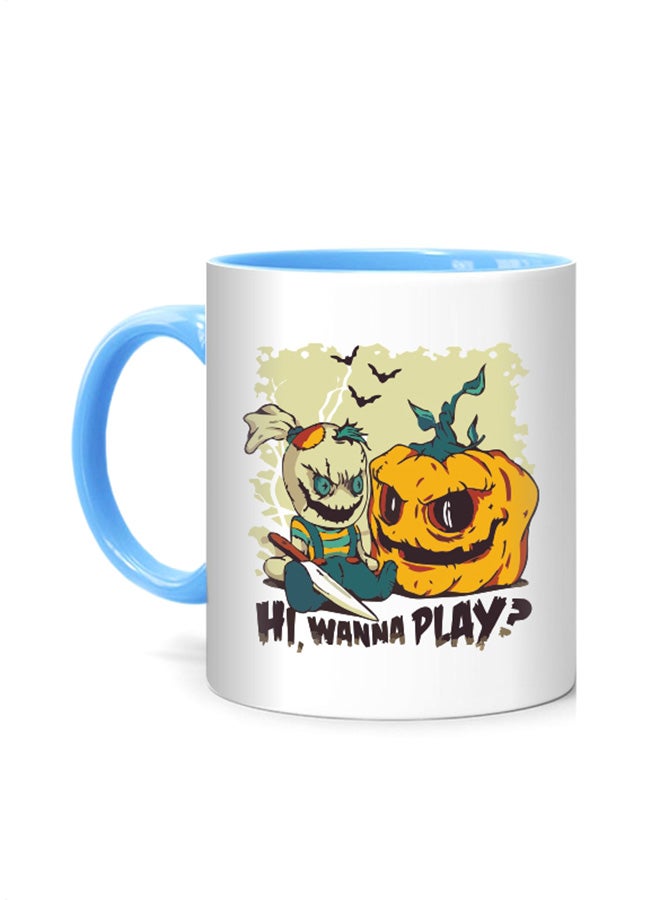 مج بلون أزرق من الداخل مطبوع عليه عبارة "Wanna Play" وتصميم شرير للهالووين أبيض/أزرق
