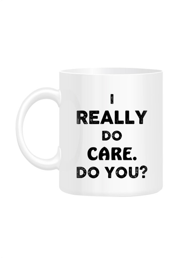 مج مطبوع عليه عبارة "I Really do care" أبيض 10سم