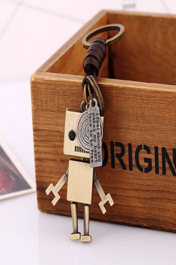 سلسلة مفاتيح بتصميم كلاسيكي جلدي بنمط منسوج مستوحى من موسيقى البانك - Image 2