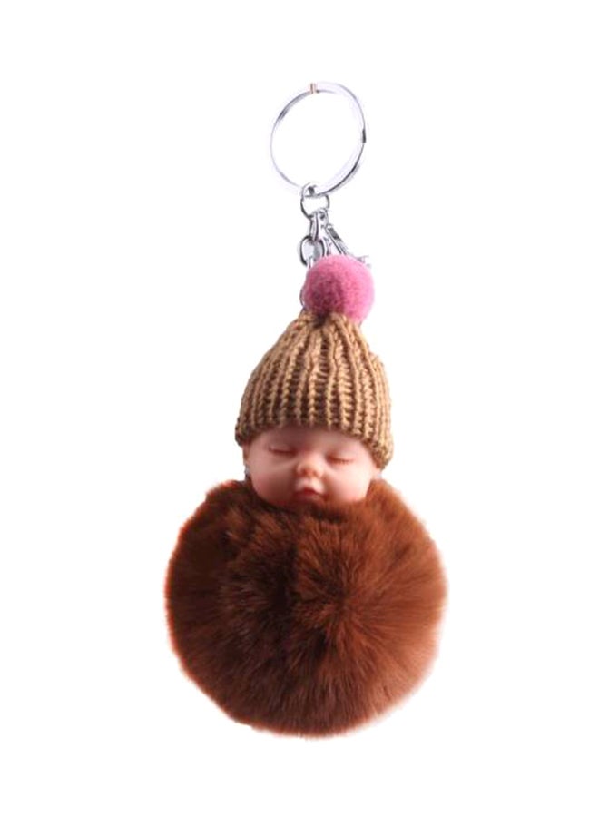 سلسلة مفاتيح على شكل طفل نائم وكرة من الفرو - Image 1