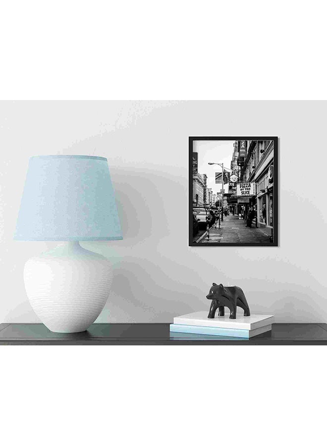 لوحة فنية لديكور الحائط بنمط هندسي بإطار أسود ومبانٍ بيضاء 111204 متعدد الألوان 32x22x2سم - Image 3