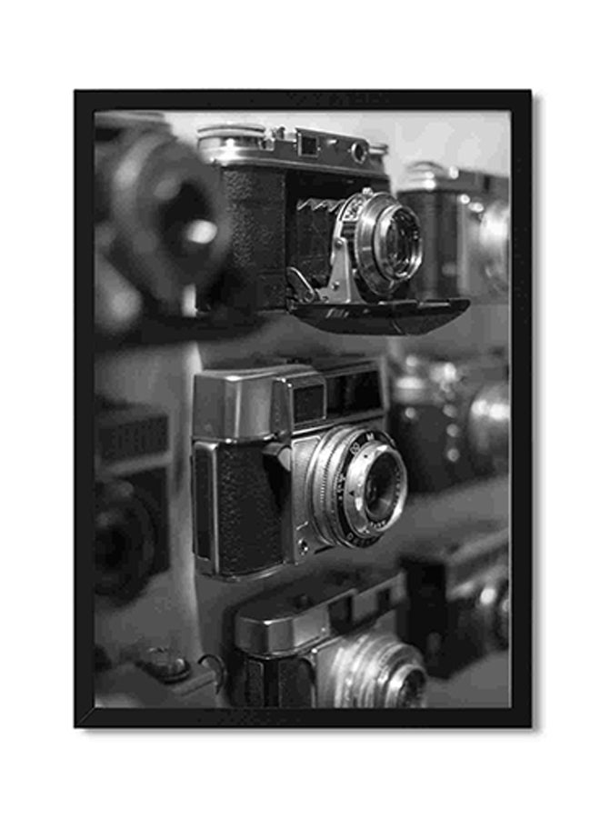 لوحة فنية لديكور الحائط تجسد صور لعدة كاميرات بنمط قديم متعدد الألوان 32x22x2سم - Image 1