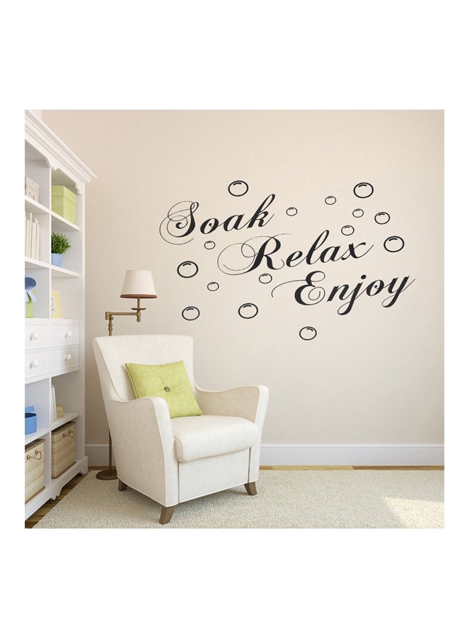 ملصق جداري بطبعة عبارة "Soak Relax Enjoy" أسود 53.5x28سم - Image 1