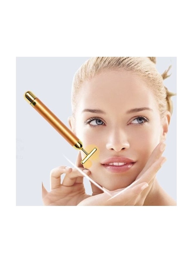 أداة تدليك يدوية للوجه ذهبي - Image 1