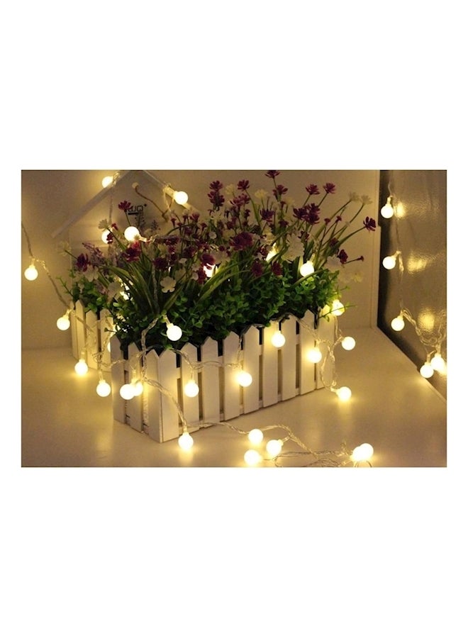 سلك إضاءة بعدد 100 مصباح LED بتصميم كرات صغيرة أصفر - Image 1