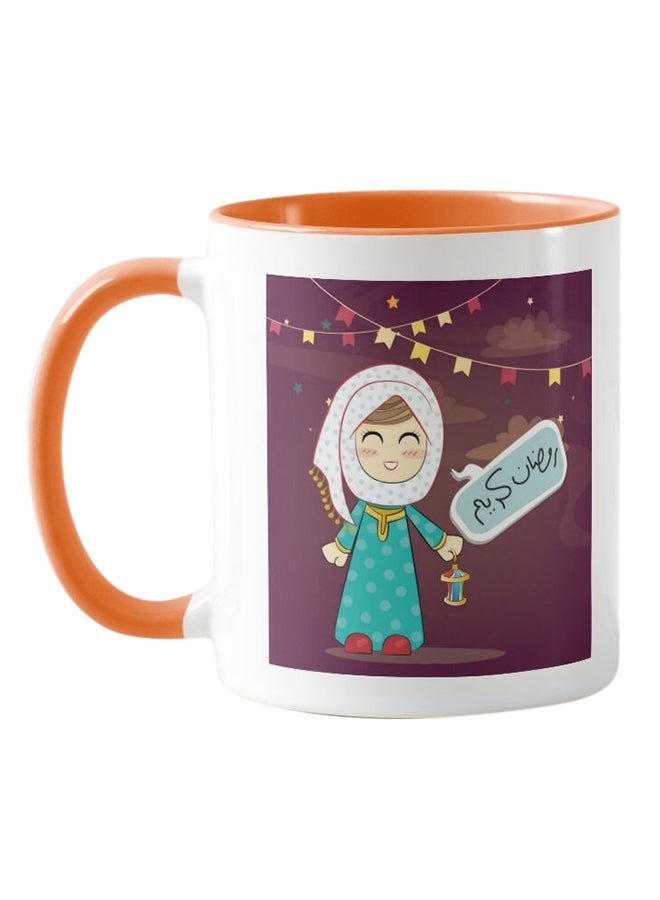 كوب مطبوع عليه عبارة "Ramadan Kareem" برتقالي / أبيض