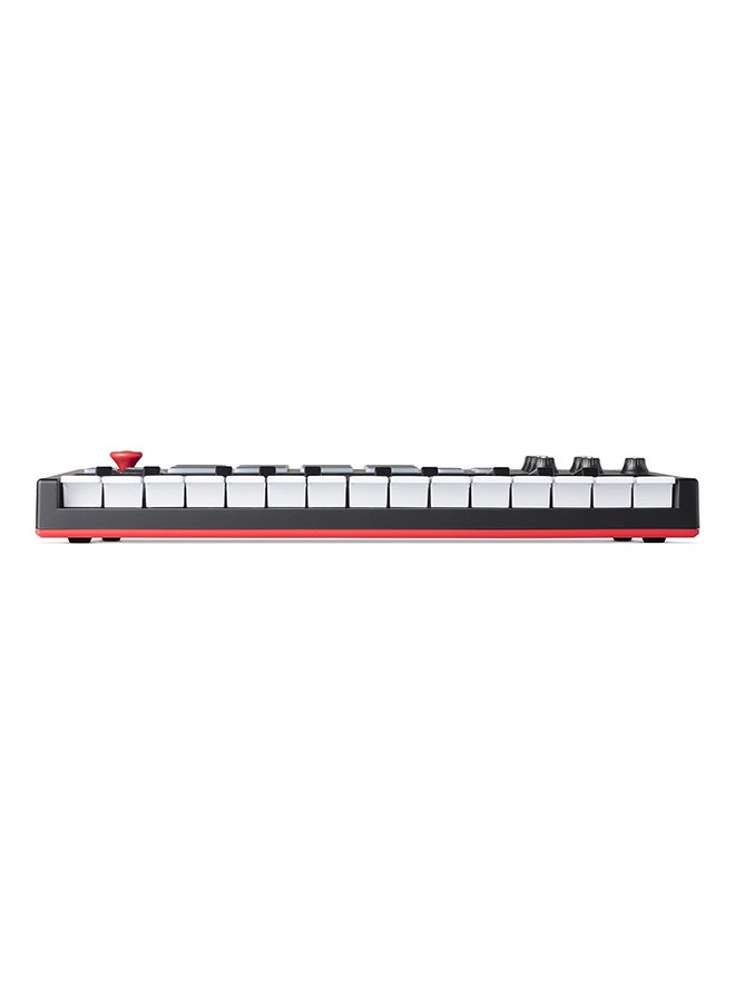 AKAI - MPK Mini Play - Compact Keyboard and Pad Controller with Integrated Sound Module - Image 1
