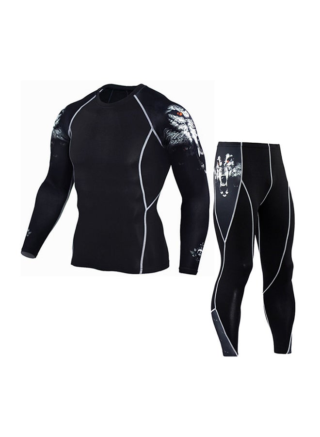 طقم رياضي مكون من تيشيرت بأكمام طويلة وبنطال أسود - Image 1