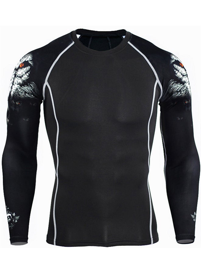 طقم رياضي مكون من تيشيرت بأكمام طويلة وبنطال أسود - Image 2