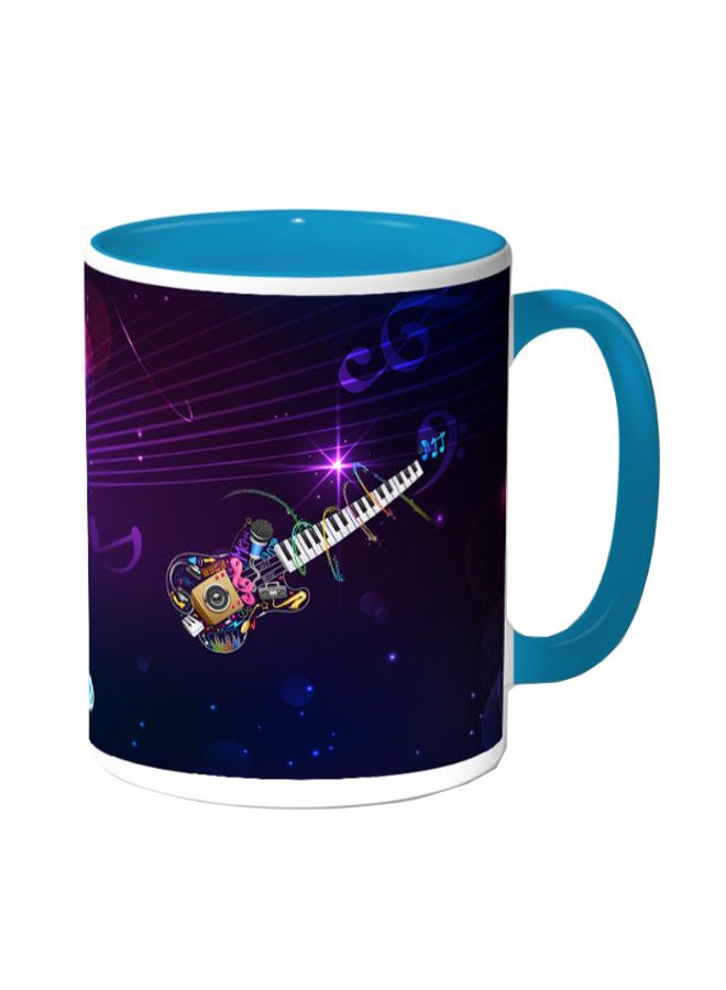ديكالاك مج قهوة مزين بطبعة بيانو وجيتار لون أزرق - Image 1