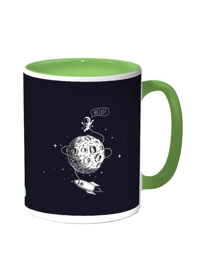 ديكالاك مج قهوة مزين بطبعة رائد فضاء أسود/أخضر - Image 1