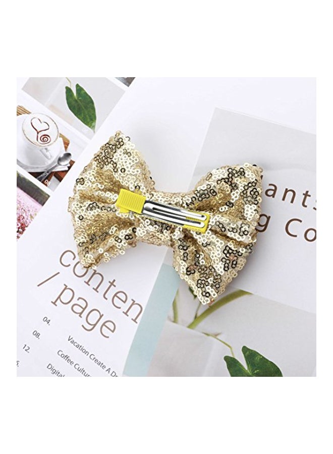 يونيكرا مشبك شعر بتصميم عقدة فيونكة ذهبي/ أسود - Image 4