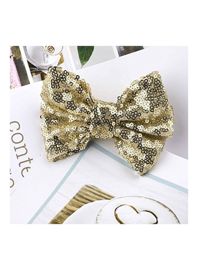 يونيكرا مشبك شعر بتصميم عقدة فيونكة ذهبي/ أسود - Image 3