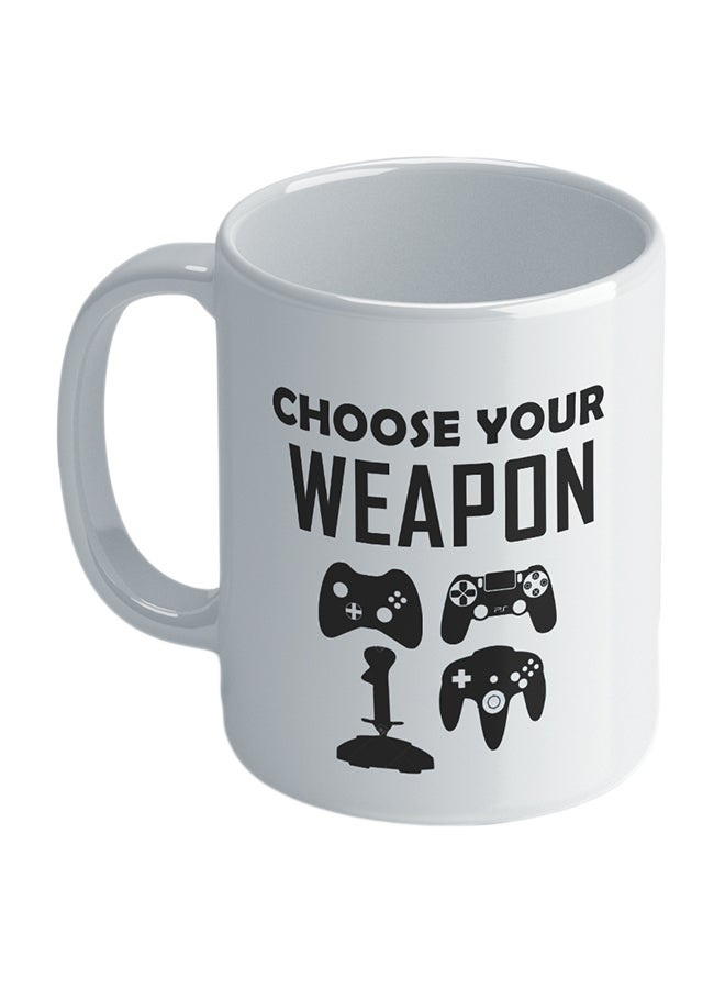 واكيليشيس مج قهوة مطبوع بعبارة "Choose Your Weapon" من سلسلة الألعاب أبيض - Image 1