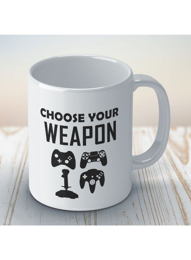 واكيليشيس مج قهوة مطبوع بعبارة "Choose Your Weapon" من سلسلة الألعاب أبيض - Image 3