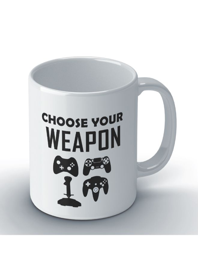 واكيليشيس مج قهوة مطبوع بعبارة "Choose Your Weapon" من سلسلة الألعاب أبيض - Image 2