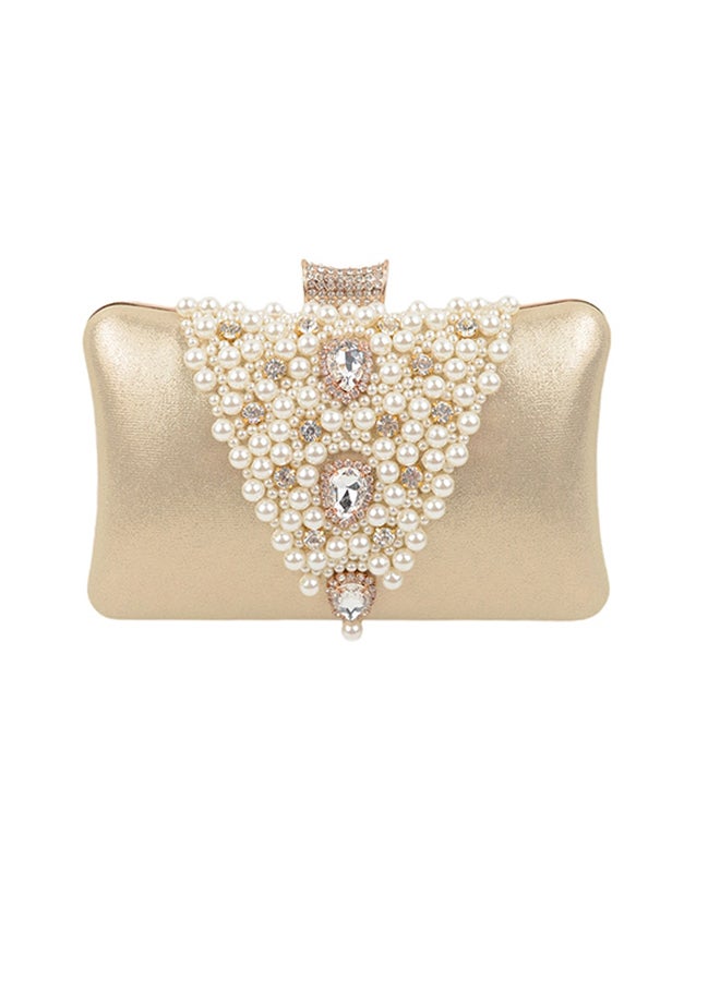 حقيبة أنيقة وعصرية مُزينة بلؤلؤ صناعي ذهبي