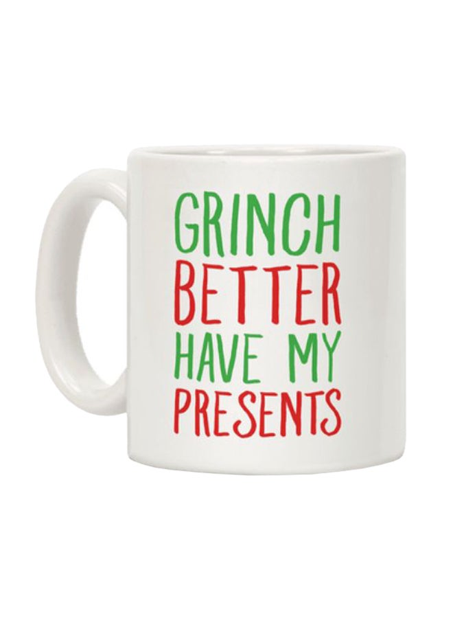 مج قهوة مطبوع بعبارة "Grinch Better Have My Presents Parody" أبيض