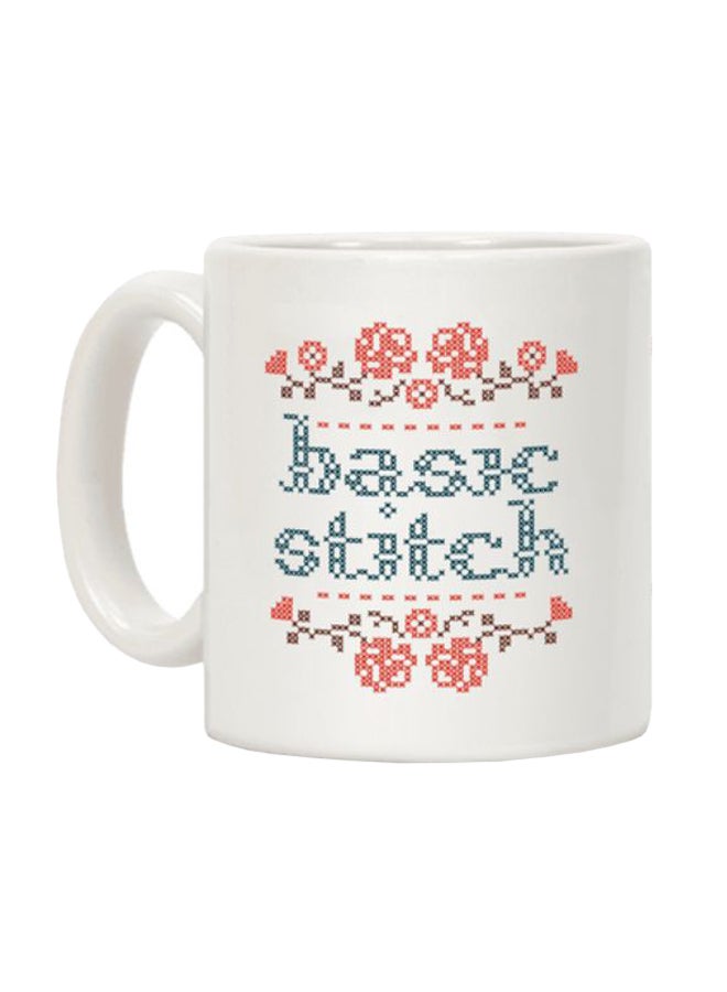 مج قهوة مطبوع عليه عبارة "Basic Stitch" أبيض