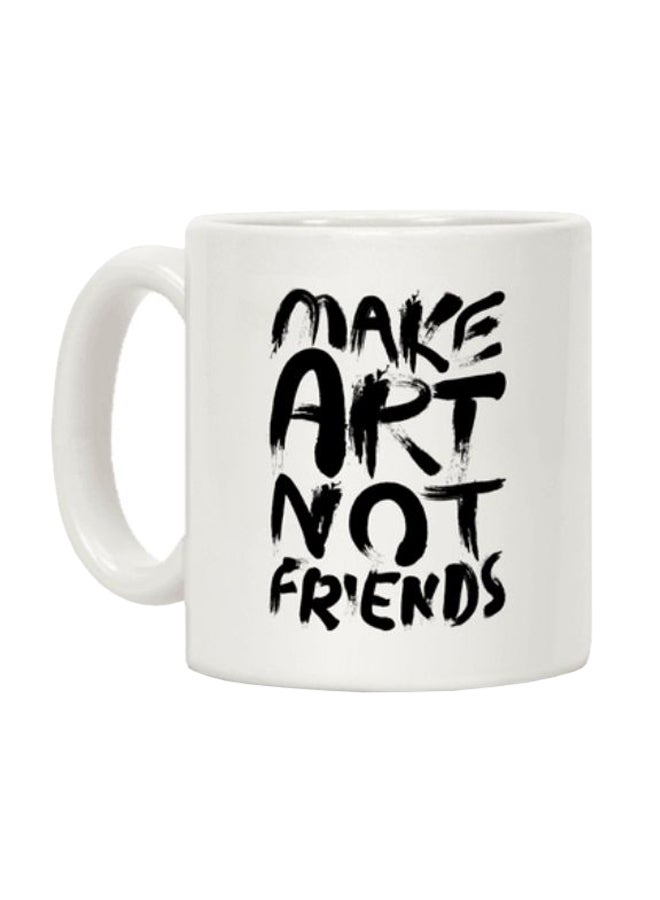 مج قهوة مزين بطبعة عبارة "Make Art Not Friends" أبيض