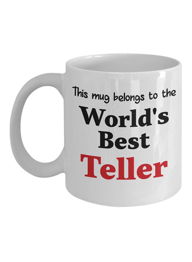 مج قهوة مطبوع عليه عبارة "World's Best Teller" أبيض